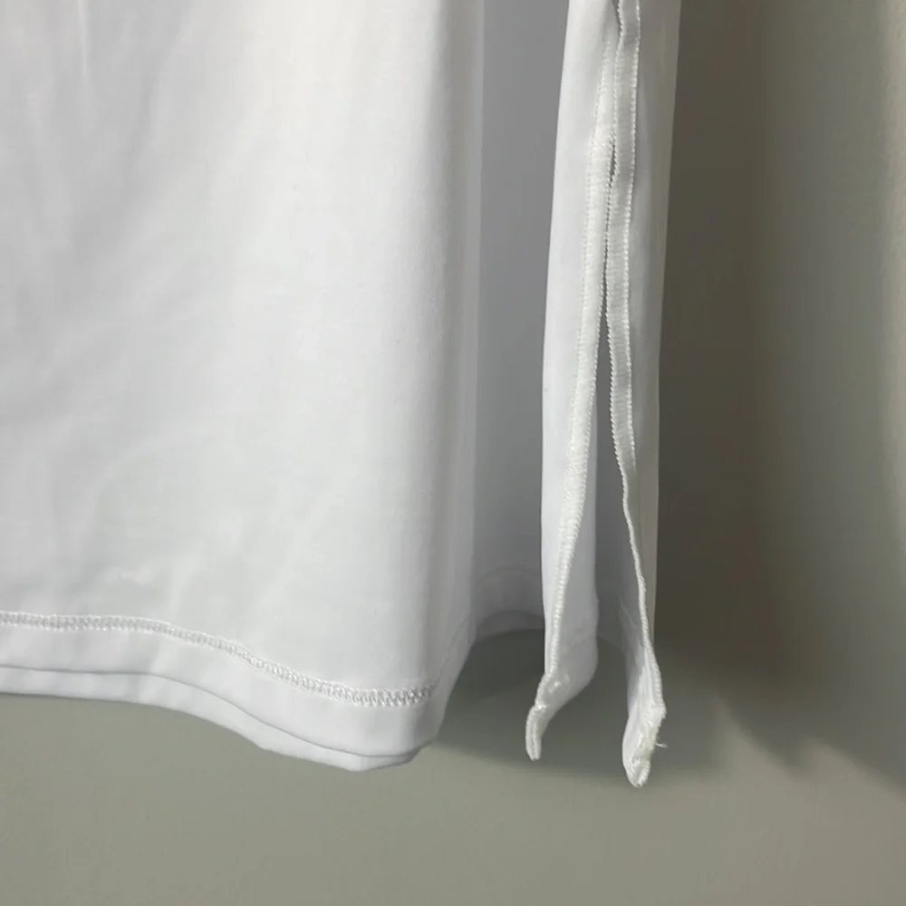 Nwt vanity fair half slip in white, size m 18” length can be adjusted.